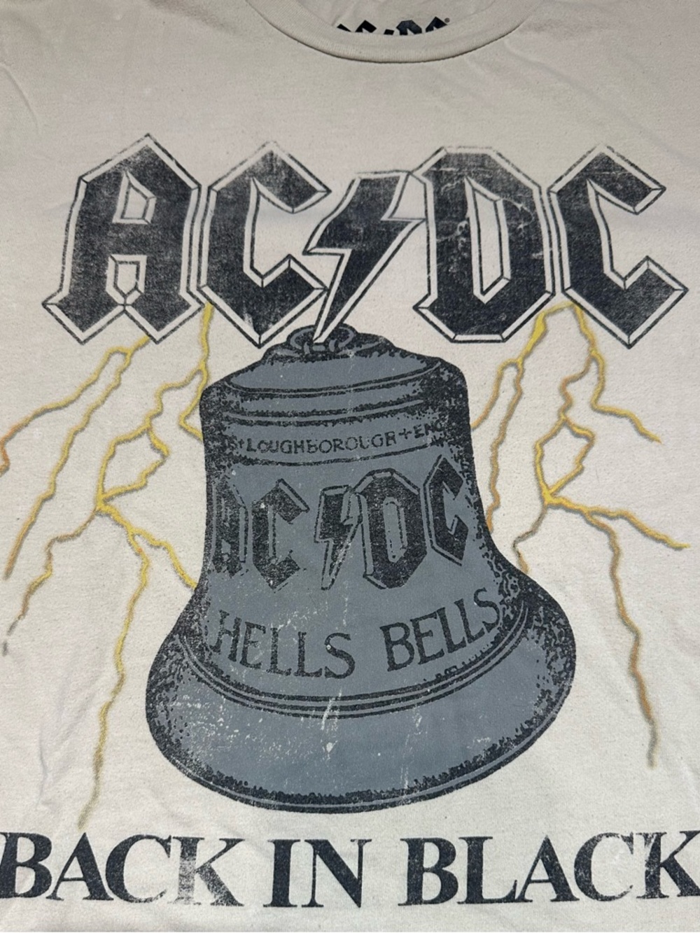 AC/DC Cream Tee with Black & Gold Bell Graphic